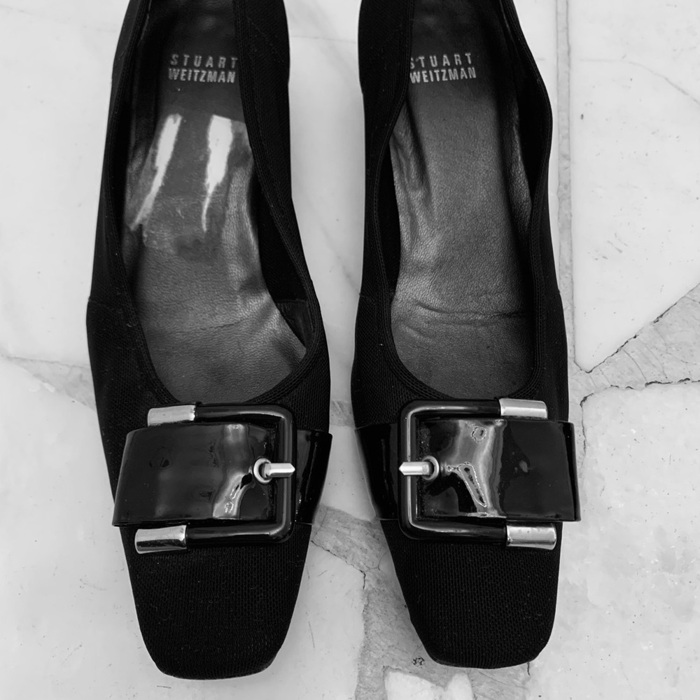 STUART WEITZMAN black 2” heels. Buckle on toe.